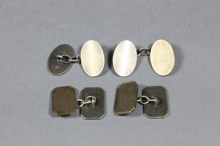 2 pairs of silver cufflinks