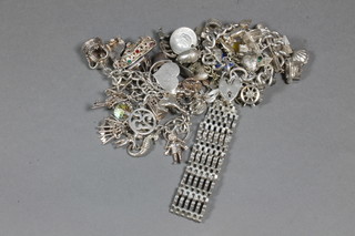 3 silver curb link bracelets hung numerous charms and a silver gate link bracelet, approx 6 ozs