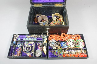 A coral necklace and a collection of costume jewellery contained  in a Victorian black leather jewellery box