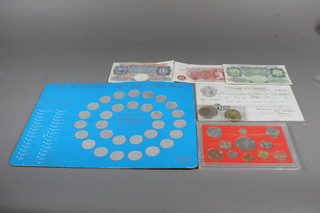 A collection of coins and bank notes