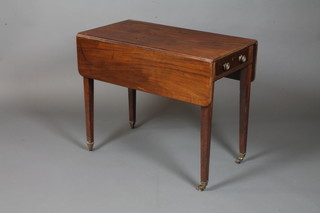 A late George III mahogany Pembroke table fitted an end drawer opposing faux fronted drawer, raised on square tapered legs,  brass caps and casters 27.5"h x 33"l x 34"w