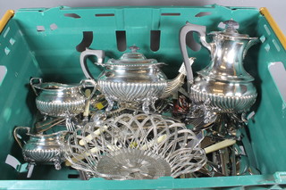 An oval Britannia metal 4 piece tea service with demi-reeded  decoration and a collection of silver plated items/flatware