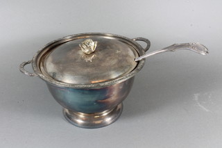 A circular silver plated twin handled punch bowl and ladle 6.5"