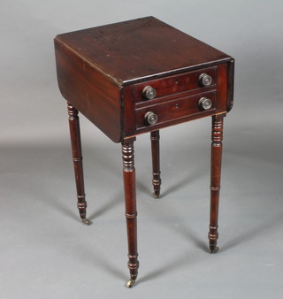 A George IV mahogany Pembroke table of small proportions  fitted 2 end drawers with 2 opposing faux fronted drawers, raised   on ringed turned and collared tapered legs with brass caps and  casters, 29"h x 30"w x 20"d