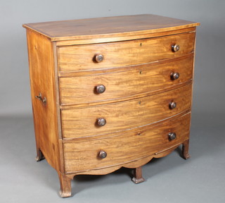 A late George III mahogany bow front chest, crossbanded and boxwood line inlaid, fitted 4 graduated long drawers on splayed  feet 43"h x 44"w x 28"d