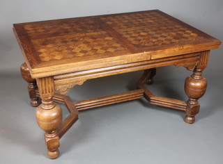 An early 20th Century Continental oak drawleaf extending dining  table raised on turned cup and cover supports united by moulded  stretcher on turned bun feet 30.5"h x 37"w x 101"l