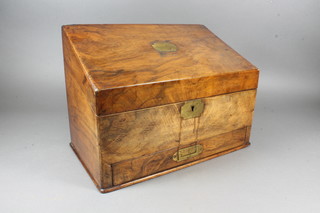 Partridge & Cooper, 192 Fleet Street London. An early Victorian  figured walnut correspondence box with hinged top enclosing a  compartmentalised interior with drawer below on a moulded  plinth base 11.5"h x 16"w x 9"d