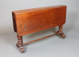 A Victorian mahogany Sutherland table, raised on turned  supports 28"h x 42"l x 6"d