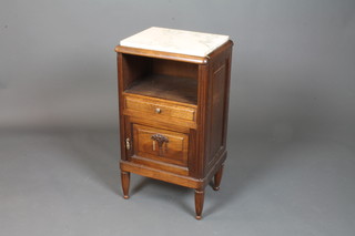An early 20th Century French walnut pot cupboard having a grey veined white marble top above a recess with drawer and cupboard  door below, raised on turned tapered reeded legs 32.5"h x 18"w  x 14"d