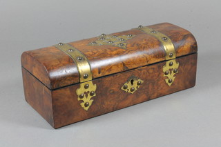 A mid Victorian figured walnut and gilt metal mounted glove box  in the gothic taste, the hinged top enclosing a silk lined interior,  3.75"h x 10"w x 4.5"d