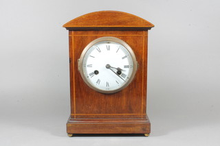 An Edwardian mahogany and barber pole inlaid mantel clock,  having Arabic and Roman enamelled dial, set 8 day quarter  repeating movement, chime on gong, 13.5"h x 9.5"w x 5.5"d