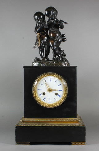 A 19th Century French slate and ormolu mantel clock  of architectural form surmounted by a bronze figural group of musical cherubs above a Roman enamelled dial set 8 day cylinder  movement signed Riglet, Paris, with count wheel strike on bell  22"h x 11"w x 6"d  ILLUSTRATED