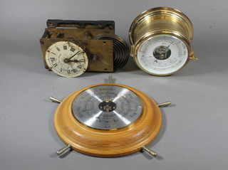 A modern Shatz binacle barometer and thermometer 7" diam., 1 other barometer and sundry clock parts