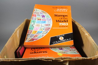 12 albums of GB and World stamps including 1983 2 volumes  SG World Cat stamps