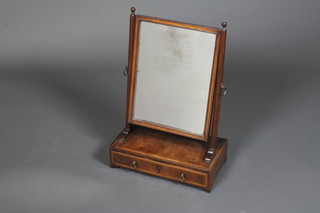 A George III mahogany toilet mirror, satinwood banded, the  rectangular plate with moulded supports above a frieze drawer,  raised on bracket feet 23.5"h x 15.5"w x 8.5"d