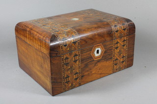 A mid Victorian walnut work box decorated with geometric  parquetry bands, the hinged top enclosed a compartmentalised  interior 6"h x 11"w x 8"d