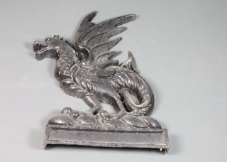 A cast iron wall plaque in the form of a Wyvern 31"
