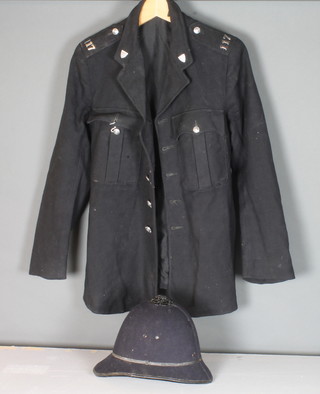 An Elizabeth II West Sussex Constabulary Police tunic together with helmet, no helmet plate,