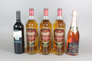 A bottle of 2008 Hardys Cabernet Merlot together with 3  bottles  of Grants Whisky and a bottle of Campanula Point