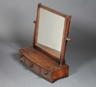 A George III mahogany toilet mirror, having rectangular plate  above 3 small drawers, raised on bracket feet 24"h x 22"w x  8.5"d