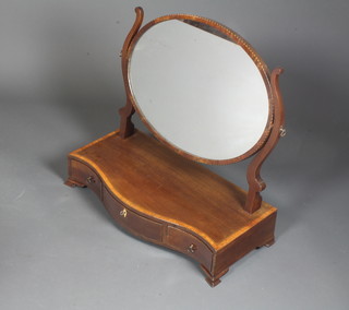 A good George III mahogany serpentine toilet mirror, rosewood crossbanded, fitted an oval plate with scroll supports above a box  base fitted 3 small drawers, raised on ogee bracket feet 24"h x  25"w x 12"d