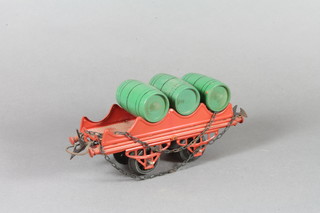 A Hornby "O" gauge barrel wagon, No.RS691, in red livery,  lacking 1 barrel, boxed, 7.5"l