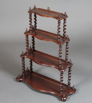 A Victorian mahogany 4 tier serpentine wall mounted what-not,  the shaped tiers with barley twist column supports, raised on bun  feet 28"h x 23"w x 8"d