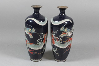 A pair of Japanese black ground cloisonne vases decorated  dragons 6"