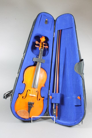 A childs violin - The Stentor Student 1, with 2 piece back 12.5" together with a bow by P&H of London, complete with plush  lined carrying case