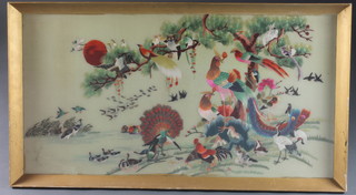 A Japanese silk embroidered panel depicting exotic birds 20" x  39"