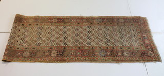 A Caucasian runner with multi-row borders 74" x 37"
