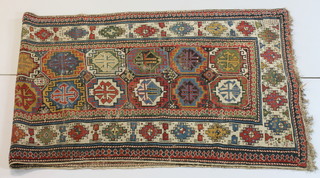 A Caucasian runner with octagons to the centre 116" x 43"