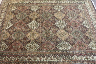 An Indian wool pile rug with overall geometric design 123" x 97"