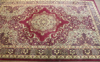 An Axeminster red ground Persian design carpet 107" x 108"