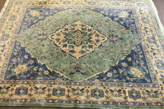 A 1920's blue ground machine made Chinese style rug 141" x  102"