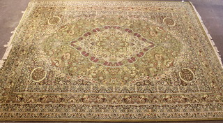 A green ground machine made Persian design carpet 142" x  108"