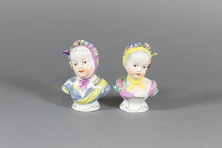 A pair of 19th Century Dresden porcelain portrait busts of bonnetted girls 3"