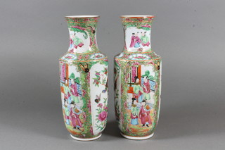 A pair of Canton famille rose porcelain club shaped vases  decorated court figures 9.5"