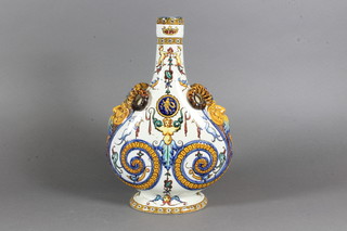 A faience moon flask with grotesque head and twin handles, the  base marked Gien 11"