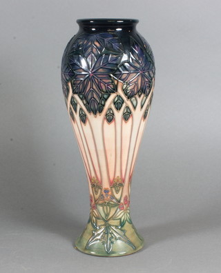 A Moorcroft vase of waisted form the base impressed Moorcroft  and with 3 bar gate mark to base 11"  ILLUSTRATED