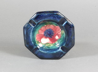 An octagonal Moorcroft blue glazed ashtray decorated anemones  4"