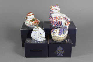 4 Royal Crown Derby porcelain paperweights in the form of  animals, a figure of a seated "fat cat" base marked LIX - second,  a figure of a Blackwell duckling marked LX1, a wren and a  rabbit marked MMVII