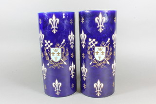 A pair of French Luneville blue glazed cylindrical vases decorated fleur de lis and the cross of Lorraine 11"   ILLUSTRATED