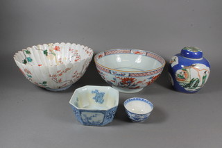 A Japanese Kakiemon bowl with lobed body decorated flowers  10" and 1 other 9", both f and r, a ginger jar, square porcelain  dish etc