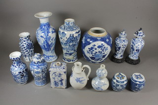 A Chinese blue and white baluster shaped vase decorated figures,  the base with 6 character mark 10" together with 12 other blue and white vases, some f and r