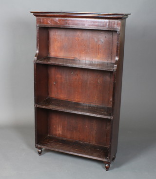 A late George III mahogany and pine cascading bookcase having  reeded carcass and fitted 2 shelves, raised on toupee feet,  modified 52"h x 32"w x 10"d