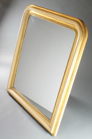 A mid Victorian gilt wood over mantel wall mirror, beige painted and parcel gilded with cushion frame 45"h x 38"w