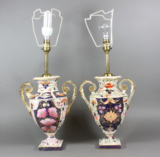 A pair of 19th Century Derby Imari pattern twin handled urns,  converted to table lamps 12", r and r,