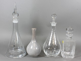 A Chinese Art Pottery club shaped vase 8", an etched glass spirit decanter and stopper and 2 glass decanters and stoppers