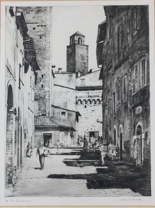 John C Moody, a dry point etching, a street scene in San  Gimignano, signed in pencil to margin 10"h x 8"w